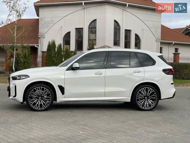 Білий БМВ Х5, об'ємом двигуна 3 л та пробігом 10 тис. км за 81900 $, фото 4 на Automoto.ua