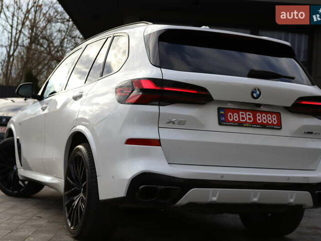 Білий БМВ Х5, об'ємом двигуна 3 л та пробігом 4 тис. км за 73899 $, фото 7 на Automoto.ua