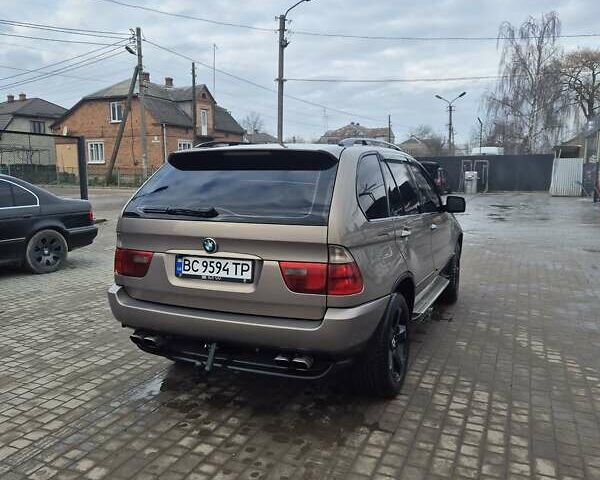 Бежевый БМВ Х5, объемом двигателя 2.99 л и пробегом 477 тыс. км за 10000 $, фото 3 на Automoto.ua