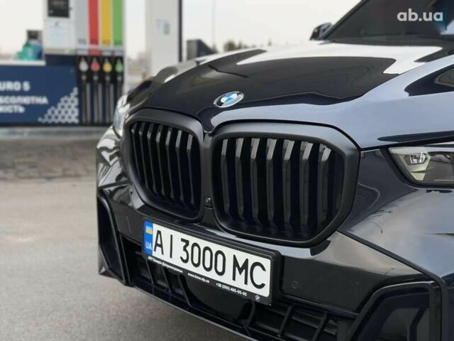 Черный БМВ Х5, объемом двигателя 3 л и пробегом 21 тыс. км за 105000 $, фото 2 на Automoto.ua
