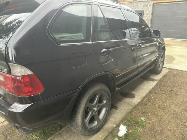 Чорний БМВ Х5, об'ємом двигуна 3 л та пробігом 300 тис. км за 3990 $, фото 4 на Automoto.ua