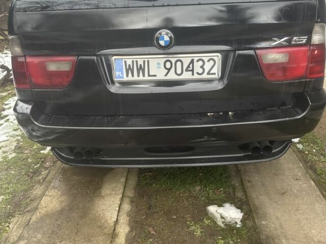 Чорний БМВ Х5, об'ємом двигуна 3 л та пробігом 300 тис. км за 3990 $, фото 3 на Automoto.ua