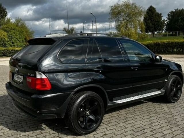 Чорний БМВ Х5, об'ємом двигуна 3 л та пробігом 215 тис. км за 3700 $, фото 5 на Automoto.ua