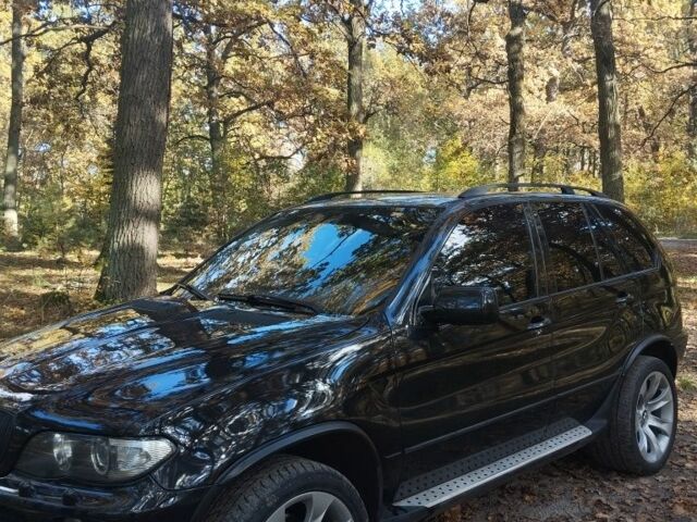 Черный БМВ Х5, объемом двигателя 4 л и пробегом 300 тыс. км за 4500 $, фото 4 на Automoto.ua