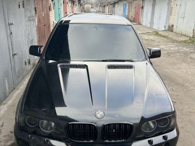 Черный БМВ Х5, объемом двигателя 2.9 л и пробегом 360 тыс. км за 12000 $, фото 1 на Automoto.ua