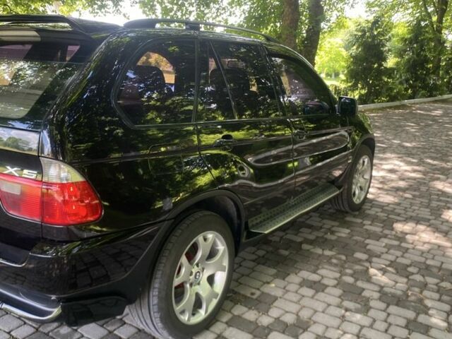 Чорний БМВ Х5, об'ємом двигуна 3 л та пробігом 310 тис. км за 11850 $, фото 9 на Automoto.ua