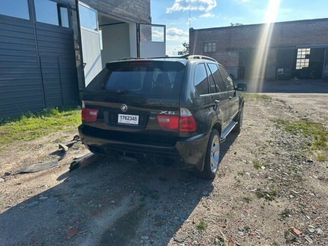Черный БМВ Х5, объемом двигателя 3 л и пробегом 300 тыс. км за 7545 $, фото 5 на Automoto.ua