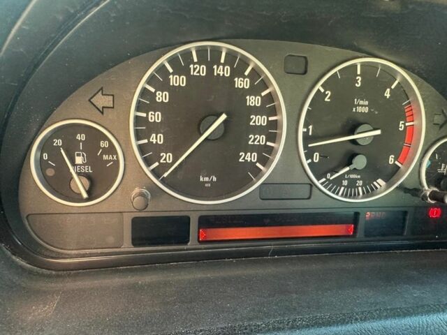 Черный БМВ Х5, объемом двигателя 3 л и пробегом 300 тыс. км за 7545 $, фото 1 на Automoto.ua