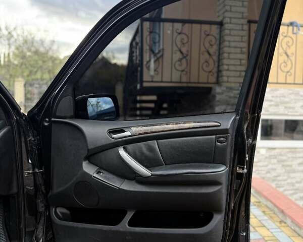 Черный БМВ Х5, объемом двигателя 4.4 л и пробегом 330 тыс. км за 6900 $, фото 19 на Automoto.ua