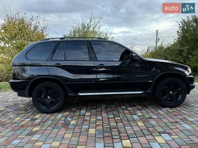 Черный БМВ Х5, объемом двигателя 4.4 л и пробегом 330 тыс. км за 6900 $, фото 17 на Automoto.ua
