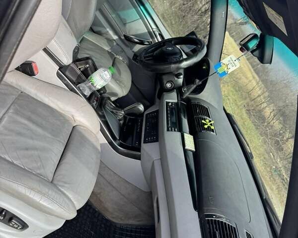 Черный БМВ Х5, объемом двигателя 3 л и пробегом 300 тыс. км за 6700 $, фото 4 на Automoto.ua