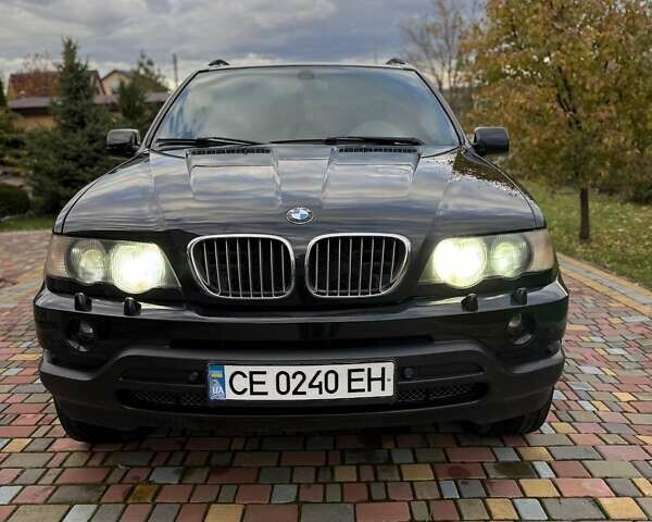 Черный БМВ Х5, объемом двигателя 4.4 л и пробегом 330 тыс. км за 6900 $, фото 4 на Automoto.ua