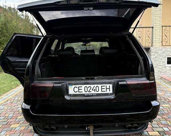 Черный БМВ Х5, объемом двигателя 4.4 л и пробегом 330 тыс. км за 6900 $, фото 30 на Automoto.ua