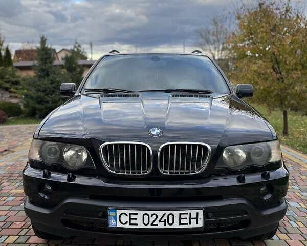 Черный БМВ Х5, объемом двигателя 4.4 л и пробегом 330 тыс. км за 6900 $, фото 1 на Automoto.ua