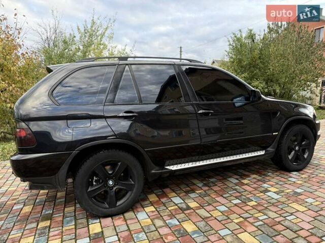Черный БМВ Х5, объемом двигателя 4.4 л и пробегом 330 тыс. км за 6900 $, фото 3 на Automoto.ua