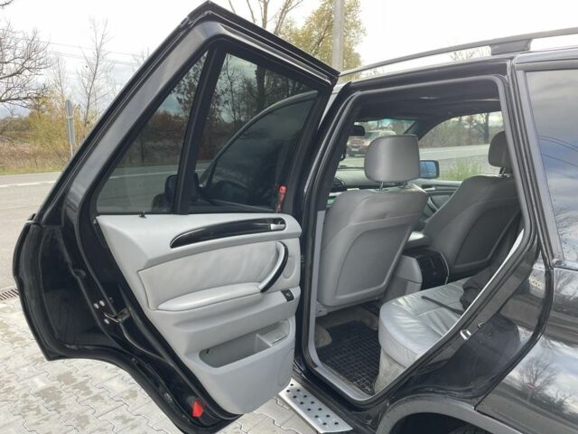 Черный БМВ Х5, объемом двигателя 3 л и пробегом 400 тыс. км за 6400 $, фото 13 на Automoto.ua