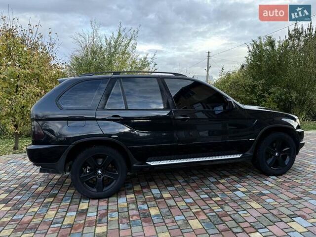 Черный БМВ Х5, объемом двигателя 4.4 л и пробегом 330 тыс. км за 6900 $, фото 9 на Automoto.ua