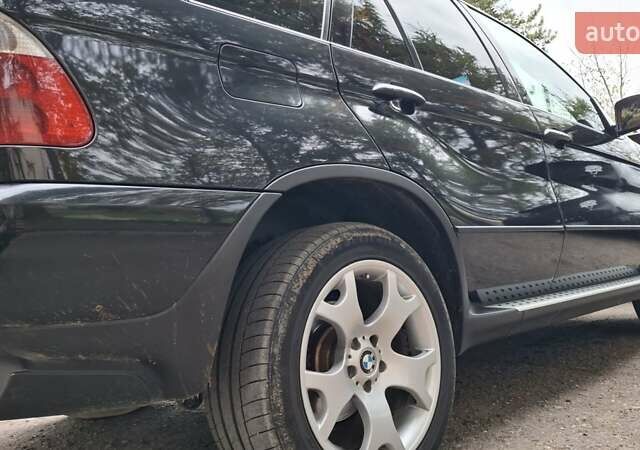 Черный БМВ Х5, объемом двигателя 3 л и пробегом 323 тыс. км за 9800 $, фото 17 на Automoto.ua