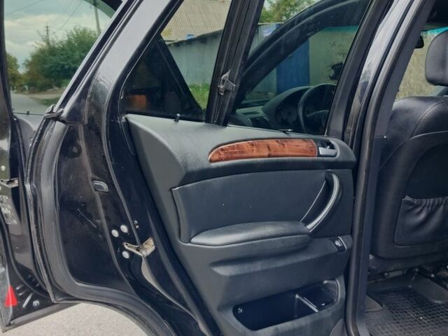Чорний БМВ Х5, об'ємом двигуна 4.4 л та пробігом 244 тис. км за 8200 $, фото 11 на Automoto.ua