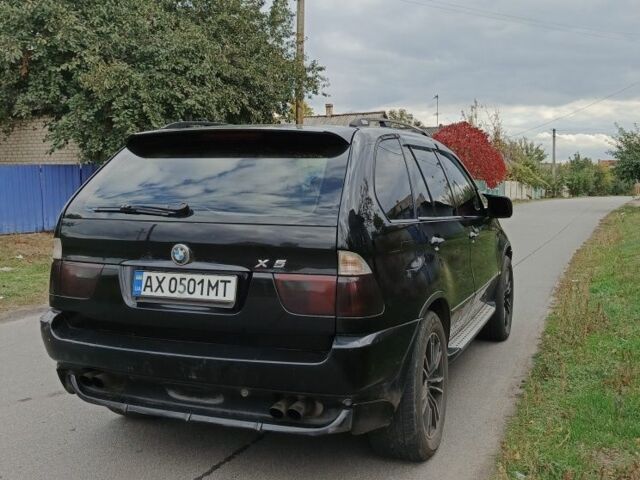 Чорний БМВ Х5, об'ємом двигуна 4.4 л та пробігом 244 тис. км за 8200 $, фото 5 на Automoto.ua