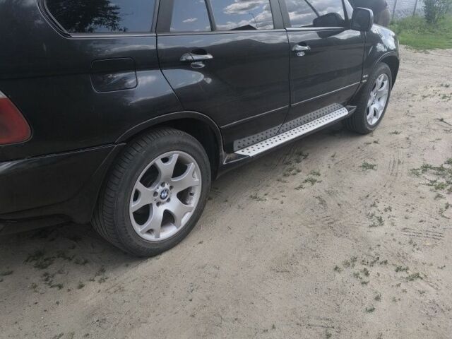 Черный БМВ Х5, объемом двигателя 4 л и пробегом 290 тыс. км за 4500 $, фото 3 на Automoto.ua
