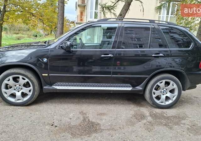 Черный БМВ Х5, объемом двигателя 3 л и пробегом 323 тыс. км за 9800 $, фото 6 на Automoto.ua