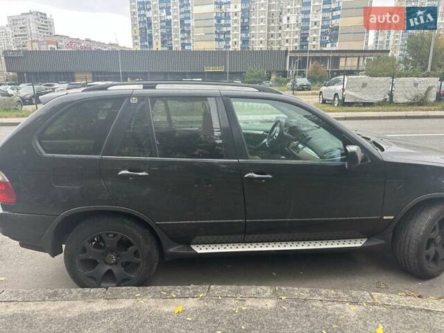 Чорний БМВ Х5, об'ємом двигуна 3 л та пробігом 388 тис. км за 4999 $, фото 1 на Automoto.ua
