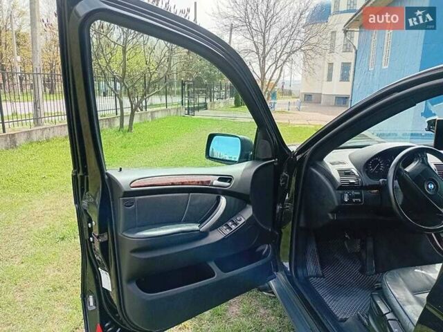 Чорний БМВ Х5, об'ємом двигуна 3 л та пробігом 400 тис. км за 9300 $, фото 10 на Automoto.ua