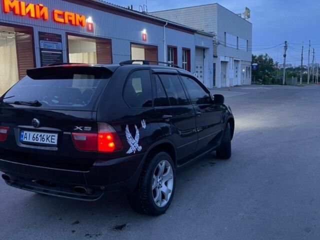Черный БМВ Х5, объемом двигателя 4.4 л и пробегом 450 тыс. км за 4700 $, фото 1 на Automoto.ua