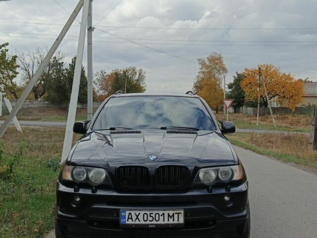 Чорний БМВ Х5, об'ємом двигуна 4.4 л та пробігом 244 тис. км за 8200 $, фото 1 на Automoto.ua