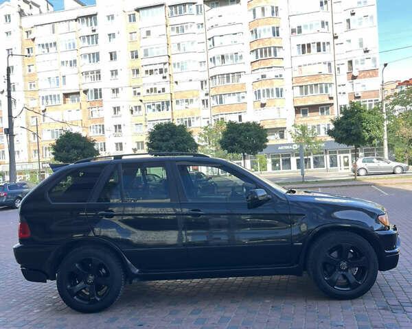 Черный БМВ Х5, объемом двигателя 4.4 л и пробегом 420 тыс. км за 6900 $, фото 4 на Automoto.ua