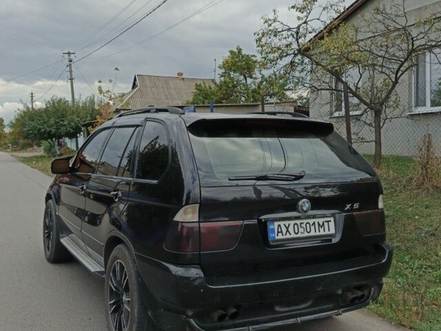 Чорний БМВ Х5, об'ємом двигуна 4.4 л та пробігом 244 тис. км за 8200 $, фото 4 на Automoto.ua