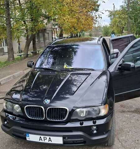 Черный БМВ Х5, объемом двигателя 3 л и пробегом 323 тыс. км за 9800 $, фото 1 на Automoto.ua