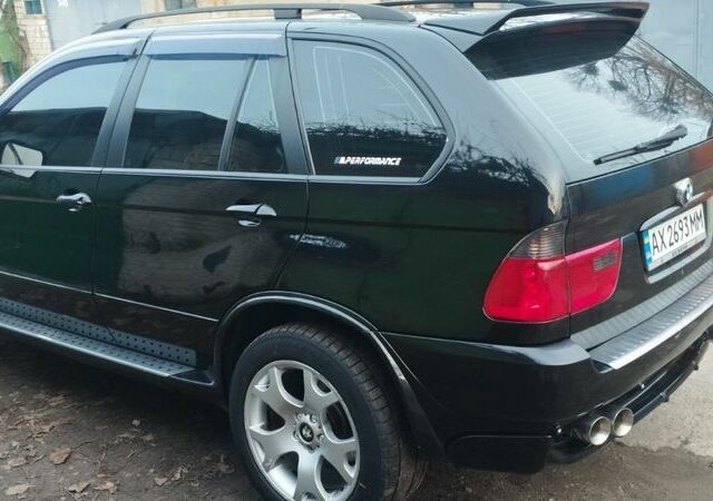 Чорний БМВ Х5, об'ємом двигуна 4.4 л та пробігом 240 тис. км за 8950 $, фото 4 на Automoto.ua