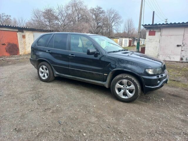 Черный БМВ Х5, объемом двигателя 3 л и пробегом 310 тыс. км за 5800 $, фото 1 на Automoto.ua