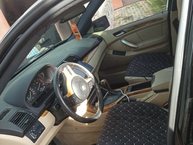 Черный БМВ Х5, объемом двигателя 3 л и пробегом 380 тыс. км за 6500 $, фото 4 на Automoto.ua