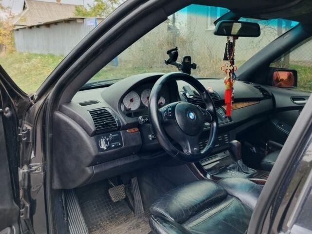 Чорний БМВ Х5, об'ємом двигуна 4.4 л та пробігом 244 тис. км за 8200 $, фото 10 на Automoto.ua