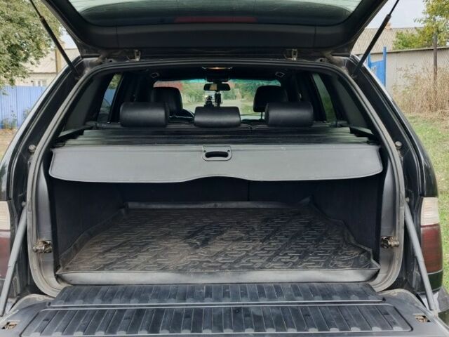 Чорний БМВ Х5, об'ємом двигуна 4.4 л та пробігом 244 тис. км за 8200 $, фото 19 на Automoto.ua