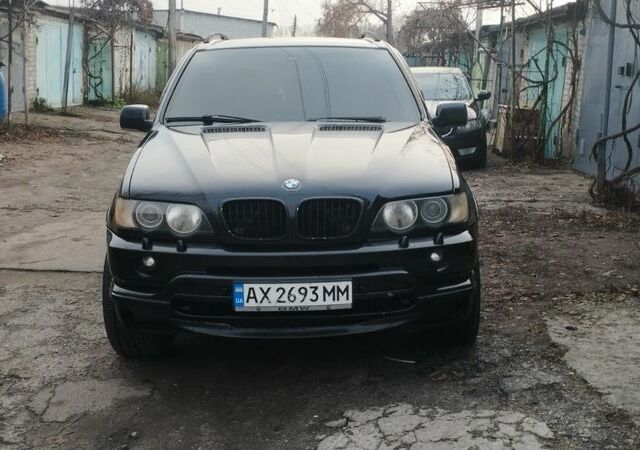 Чорний БМВ Х5, об'ємом двигуна 4.4 л та пробігом 240 тис. км за 8950 $, фото 1 на Automoto.ua