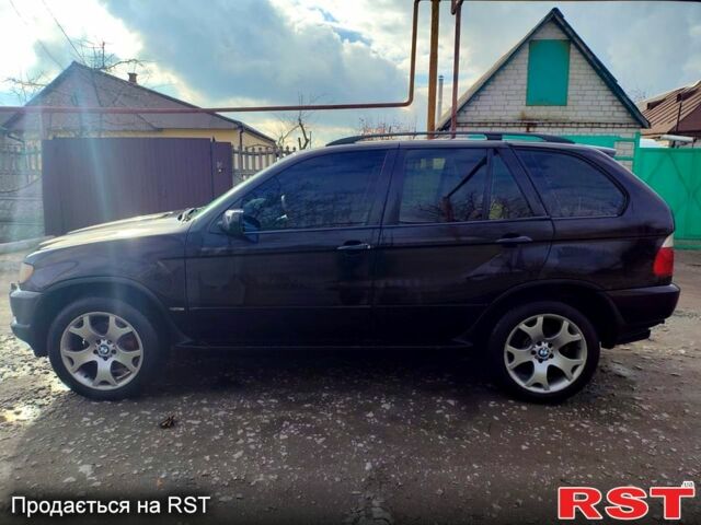 Чорний БМВ Х5, об'ємом двигуна 30 л та пробігом 450 тис. км за 6000 $, фото 4 на Automoto.ua