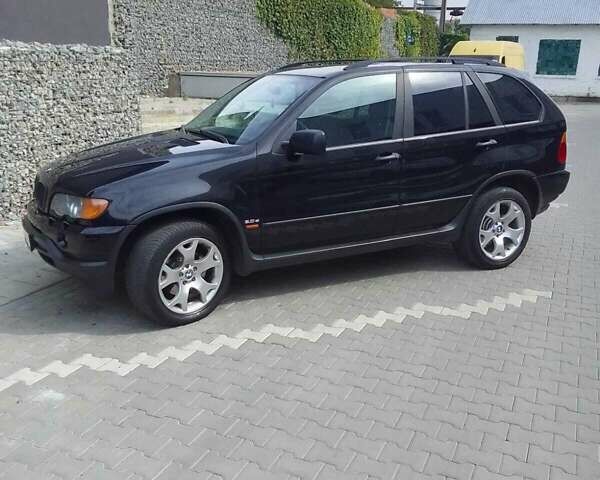 Чорний БМВ Х5, об'ємом двигуна 3 л та пробігом 400 тис. км за 9300 $, фото 26 на Automoto.ua