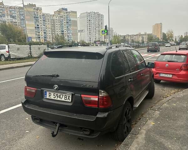 Чорний БМВ Х5, об'ємом двигуна 3 л та пробігом 388 тис. км за 4999 $, фото 2 на Automoto.ua