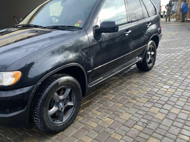 Черный БМВ Х5, объемом двигателя 3 л и пробегом 167 тыс. км за 5000 $, фото 1 на Automoto.ua