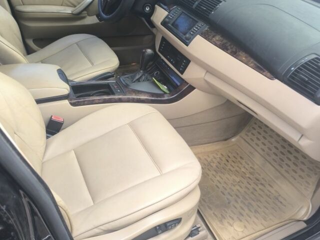 Черный БМВ Х5, объемом двигателя 4 л и пробегом 290 тыс. км за 4500 $, фото 2 на Automoto.ua