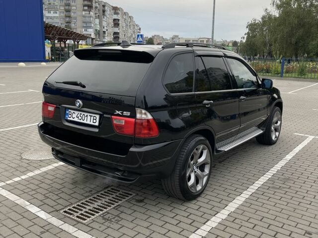 Чорний БМВ Х5, об'ємом двигуна 3 л та пробігом 350 тис. км за 9000 $, фото 3 на Automoto.ua