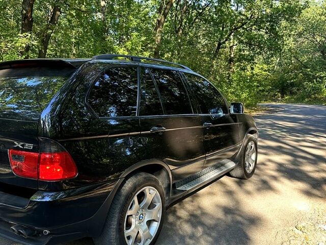 Черный БМВ Х5, объемом двигателя 4.4 л и пробегом 400 тыс. км за 8300 $, фото 1 на Automoto.ua