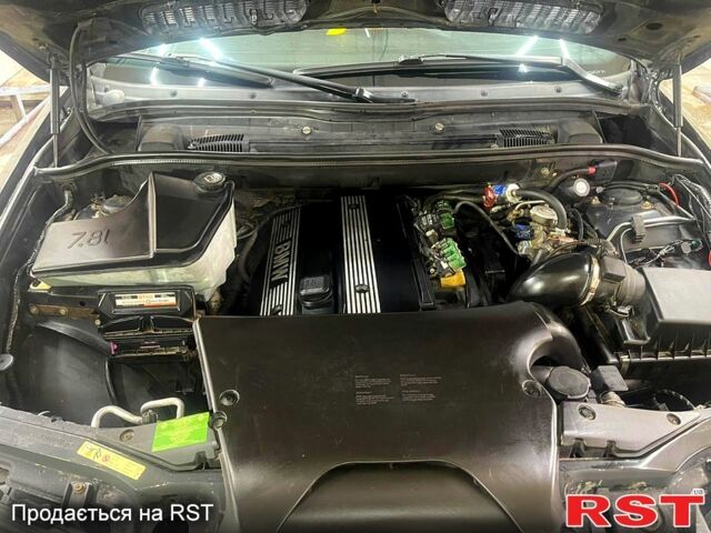 Черный БМВ Х5, объемом двигателя 3 л и пробегом 300 тыс. км за 8500 $, фото 3 на Automoto.ua