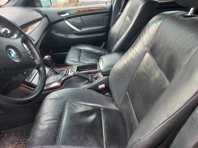 Черный БМВ Х5, объемом двигателя 3 л и пробегом 310 тыс. км за 5800 $, фото 4 на Automoto.ua