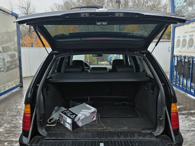 Чорний БМВ Х5, об'ємом двигуна 3 л та пробігом 400 тис. км за 5393 $, фото 4 на Automoto.ua