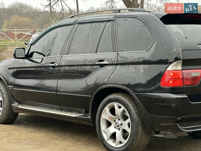 Черный БМВ Х5, объемом двигателя 2.9 л и пробегом 187 тыс. км за 12000 $, фото 7 на Automoto.ua